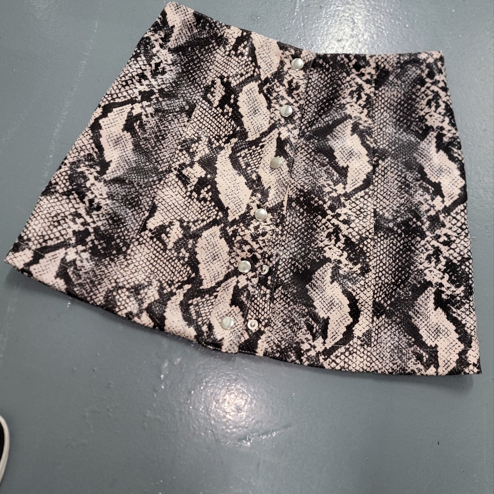Stylish Snakeskin Mini Skirt with Stud Details